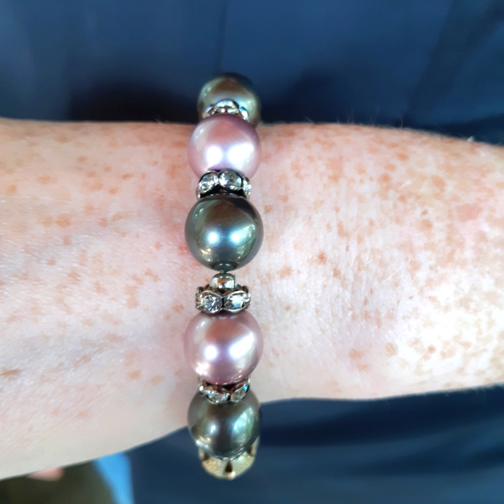 Swarovski pearls with silver tone heart.